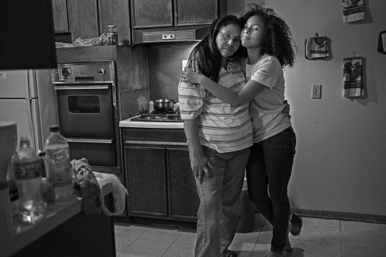 Bearstops with her mother Reva in their kitchen.