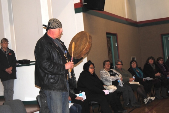 Daryle Mills, an elder-in-residence who works with youth at the Wachiay Friendship Centre, closed a community meeting about Walking With Our Sisters by drumming and singing.