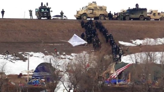 U.S. National Guard and police sweep the Dakota Access pipeline protest camp on Feb. 23, 2017. (source: livestream.com / Unicorn Riot) 